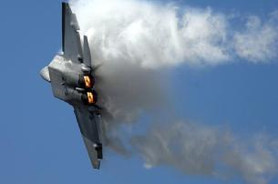 F-22 Raptor with full afterburner in a high-G turn with leading edge vortices