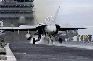 FA-18C Hornet launching from steam catapult