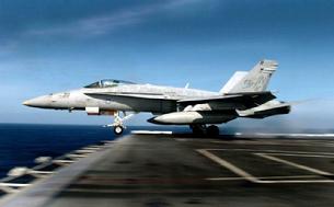 FA-18C Hornet launching off the end of the deck