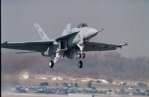 FA-18E Hornet with gear down for landing