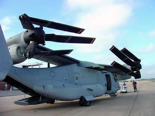 V-22 Osprey with wings, engines and propellers stowed for parking on an aircraft carrier